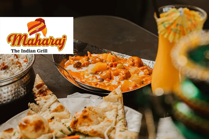 Naan, biryani and curries with a mango drink at Maharaj Indian Grill