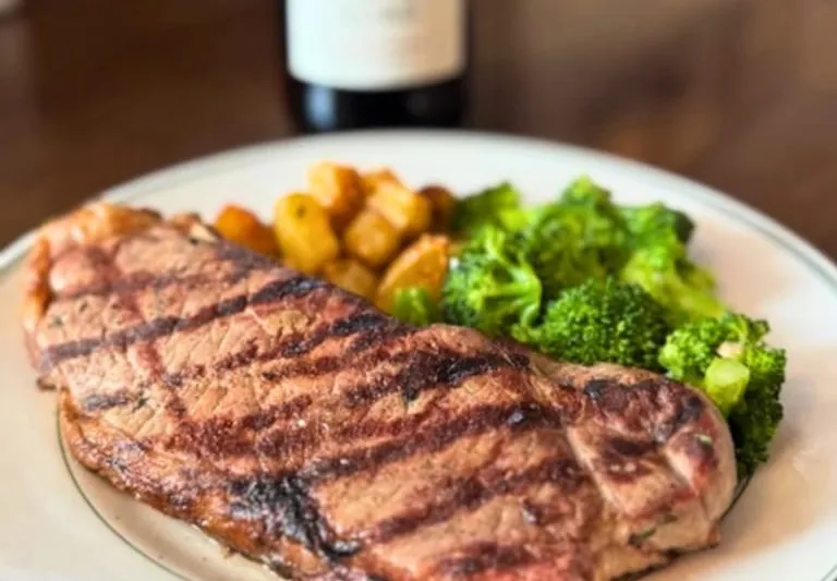 A grilled steak dinner with vegetables from Ale Mary's in Baltimore.