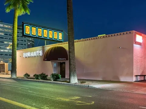Durant's neon sign and entrance at night