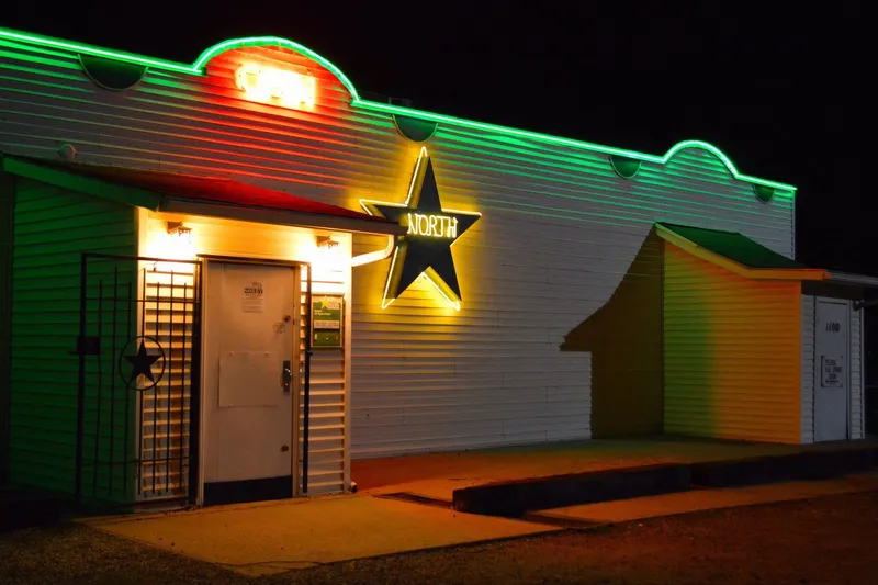 North Star Steakhouse's neon sign lit up at night