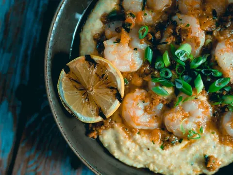 Shrimp and grits with a charred lemon at Tupelo Honey Southern Kitchen & Bar