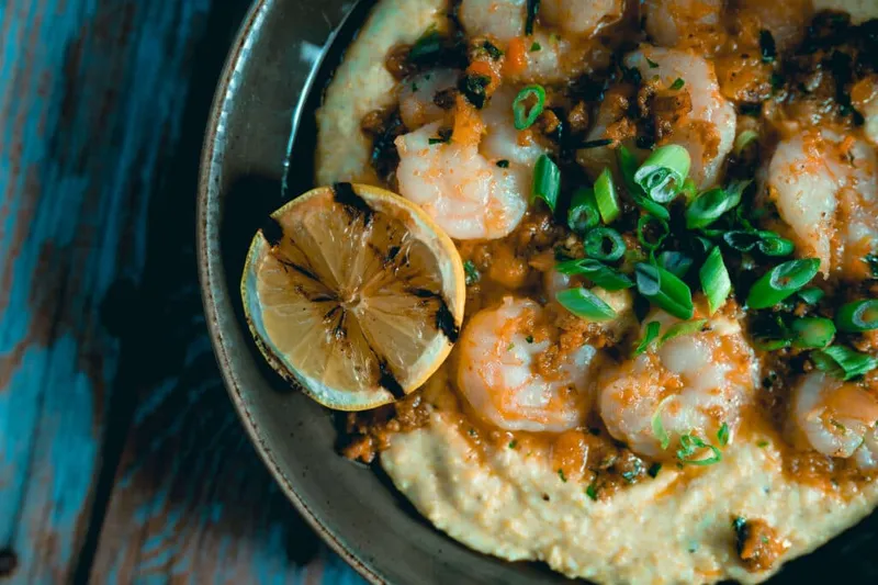Shrimp and grits with a charred lemon at Tupelo Honey Southern Kitchen & Bar
