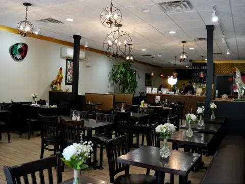 Dining room with pendant lights at Taqueria Garibaldi