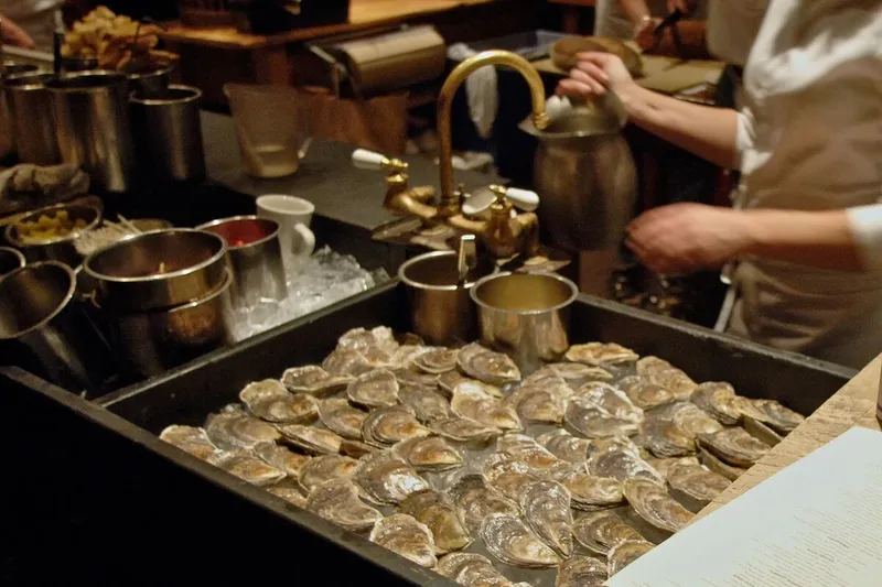 Maine oysters being prepared in the open kitchen at Fore Street