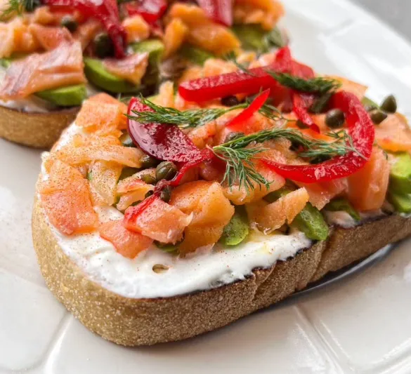 Smoked salmon toast topped with peppers at Drakes